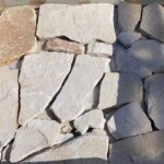 Variety of irregular flagstone pavers showcasing natural textures and colors.