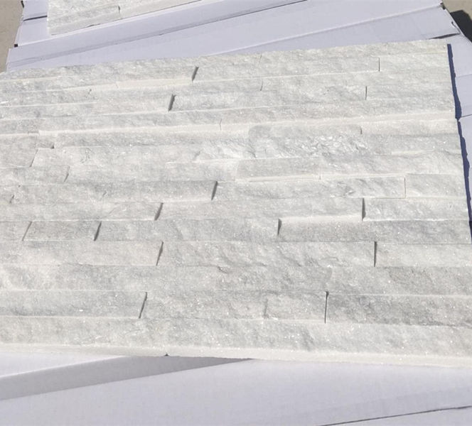 Close-up of elegant white stacked stone wall design