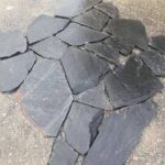 Diverse selection of irregular flagstone and pavers for landscaping