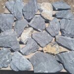 Collection of irregular flagstone pavers in various shapes and sizes