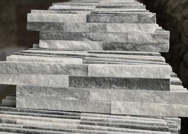 Production facilities with advanced machinery for stacked stone manufacturing
