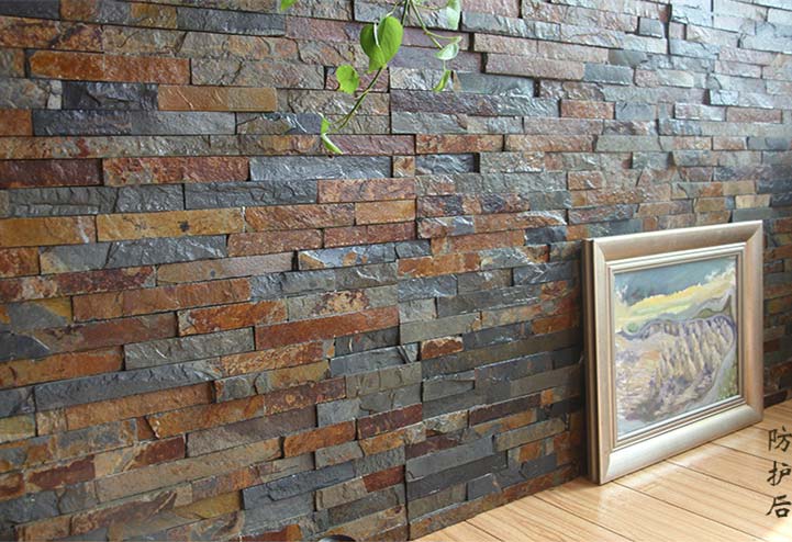 Close-up of rustic stacked stone wall tiles in earthy tones