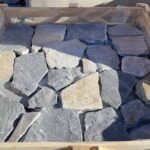 Collection of irregular flagstone pavers in various shapes and sizes