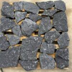 Collection of irregular flagstone pavers in various colors and sizes.