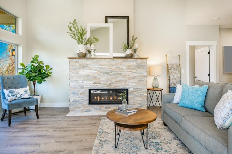 Stylish stacked stone fireplace with warm ambiance