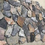 Collection of irregular flagstone pavers showcasing natural textures and colors