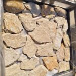 Collection of irregular flagstone pavers in various shapes and colors