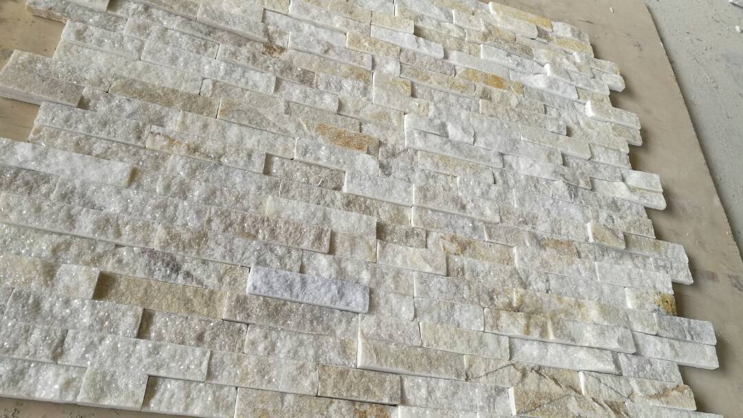 A side-by-side comparison of grouting ledger stone and dry stack stone styles