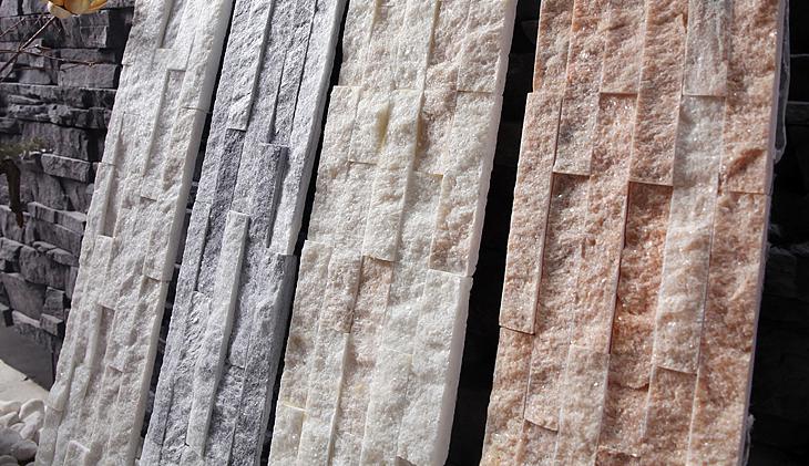 A collection of beautifully designed stacked stone panels in varying colors.