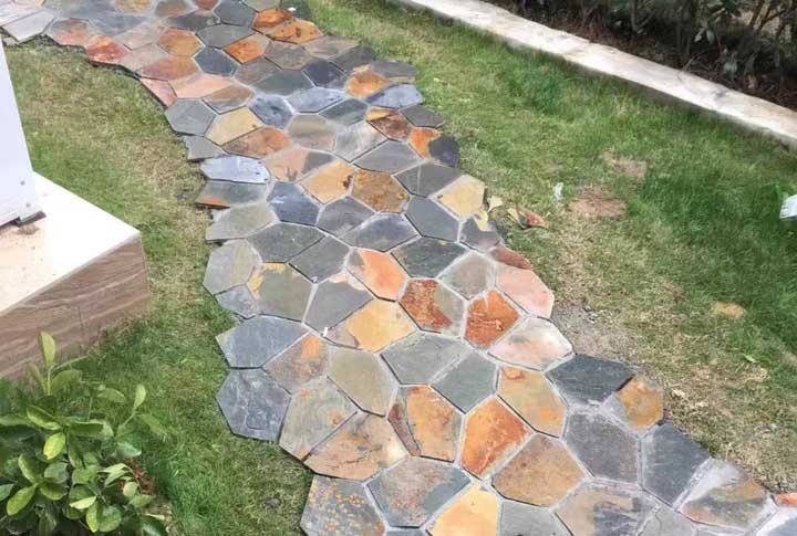 Colorful crazy paving stones arranged for outdoor pathways