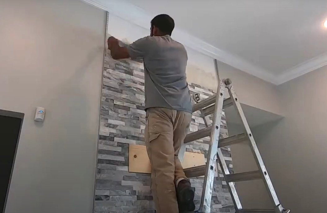 Top adhesive for installing ledger stone tiles on walls