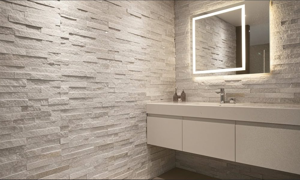 Thin stone veneer applied to a small space, creating a modern and sleek wall design