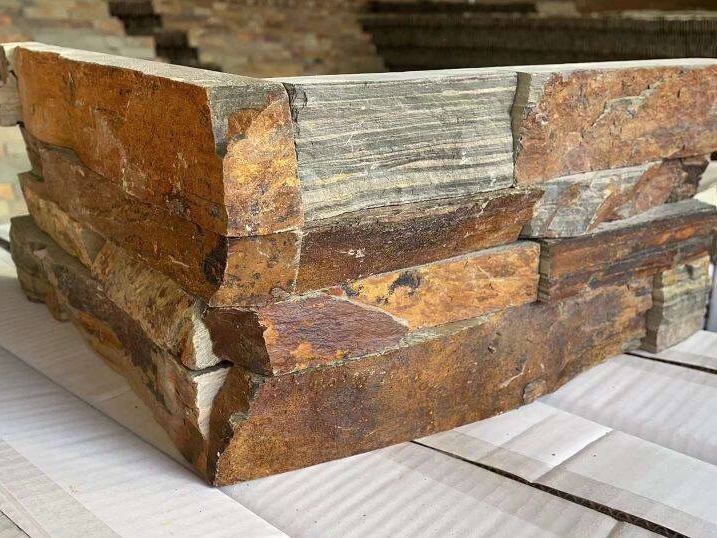 Corner view of high-quality stacked stone in natural tones