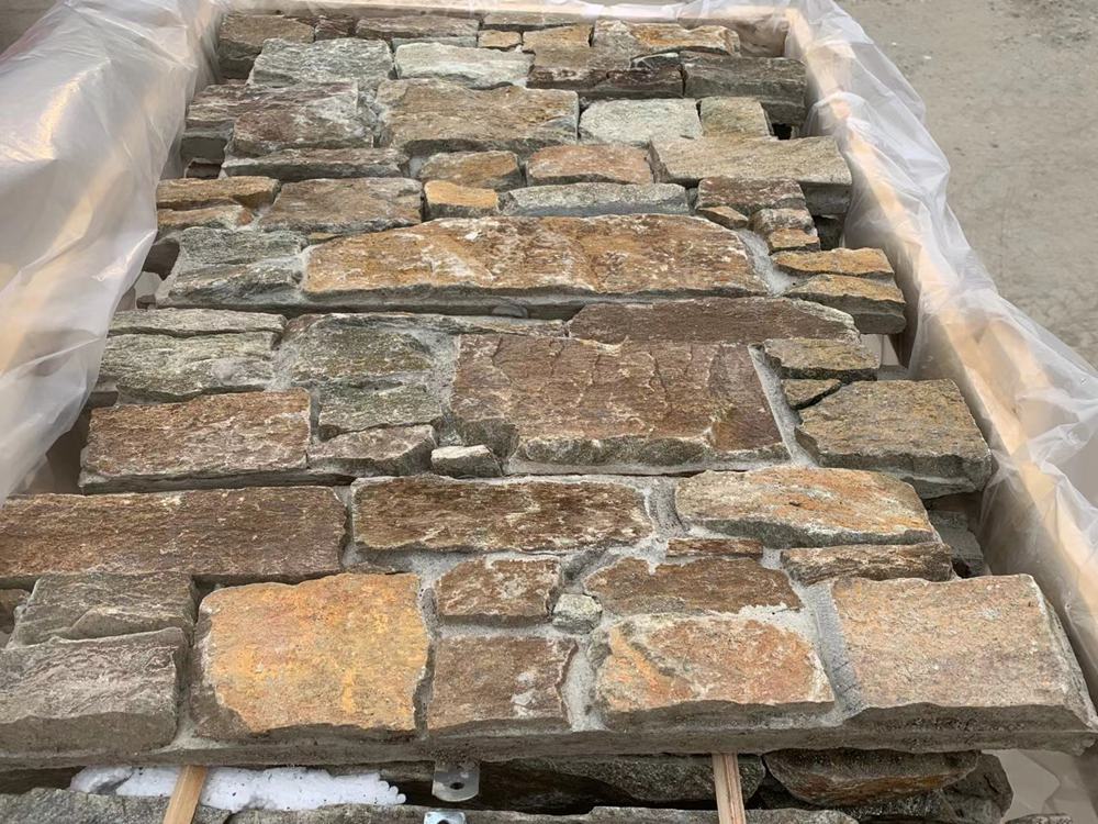 Comparison of mesh-backed and cement-backed stacked stone panels for wall cladding