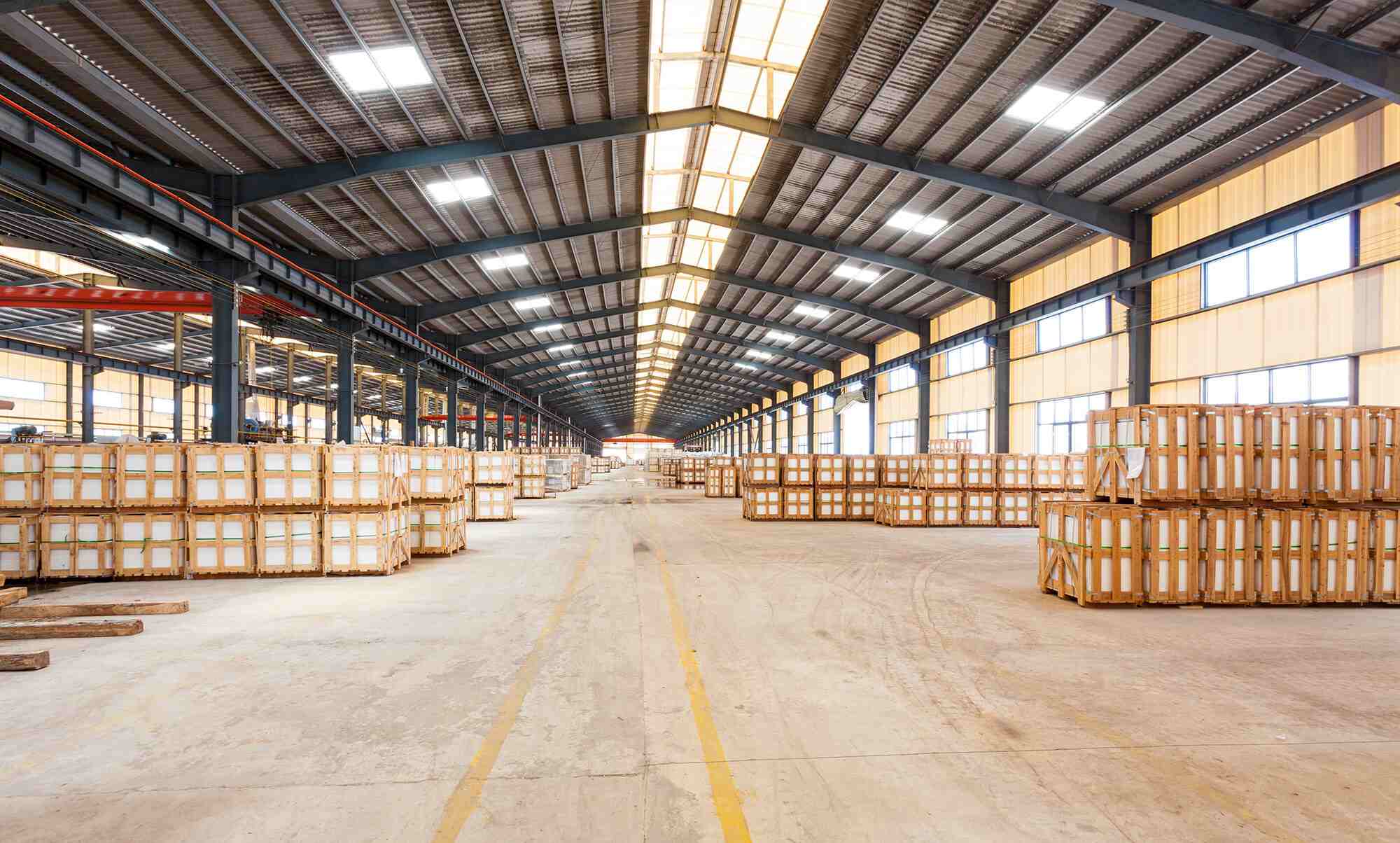Inside view of CHUNYU Slate stacked stone warehouse showcasing various stone products.