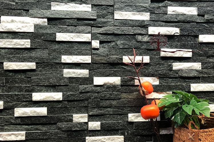 Close-up of stacked stone panels showing peeling wall texture