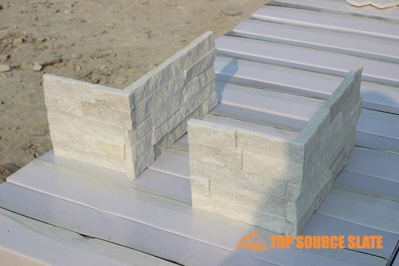 Corner view of a sleek Arctic White ledger showcasing its refined design