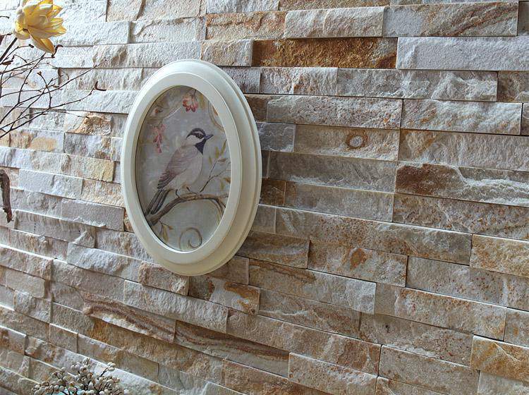 Various styles and colors of stacked stone veneer samples displayed