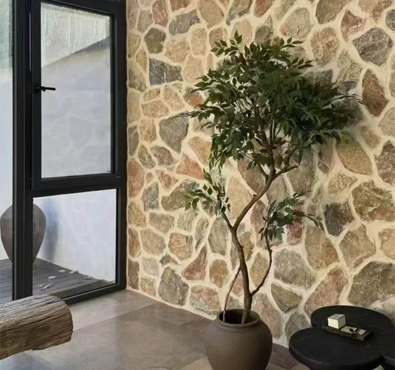 Stacked thin natural stone veneer panels in neutral tones for wall cladding
