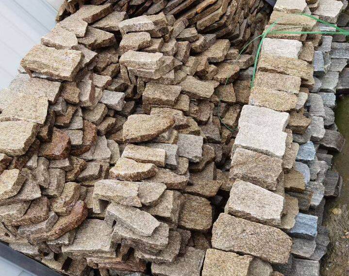 Close-up of an elegant stacked stone wall panel showcasing natural textures and colors