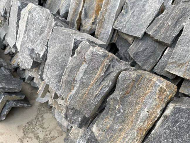 Close-up view of beautifully arranged stacked stone wall cladding
