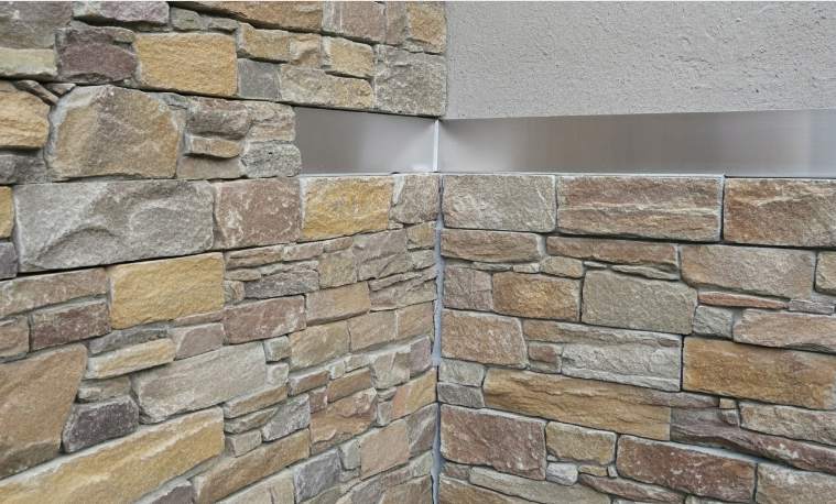 Installation of waterproofing barrier for exterior stacked stone veneer on wall