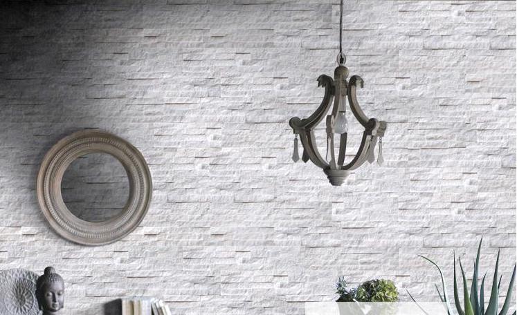 Stylish white stacked stone exterior design on a modern building