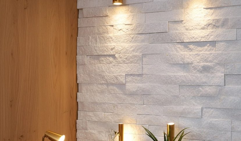 Elegant white stacked stone fireplace with modern design and clean lines