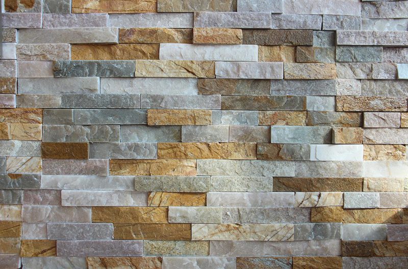 Comparison between white stacked stone and siding materials