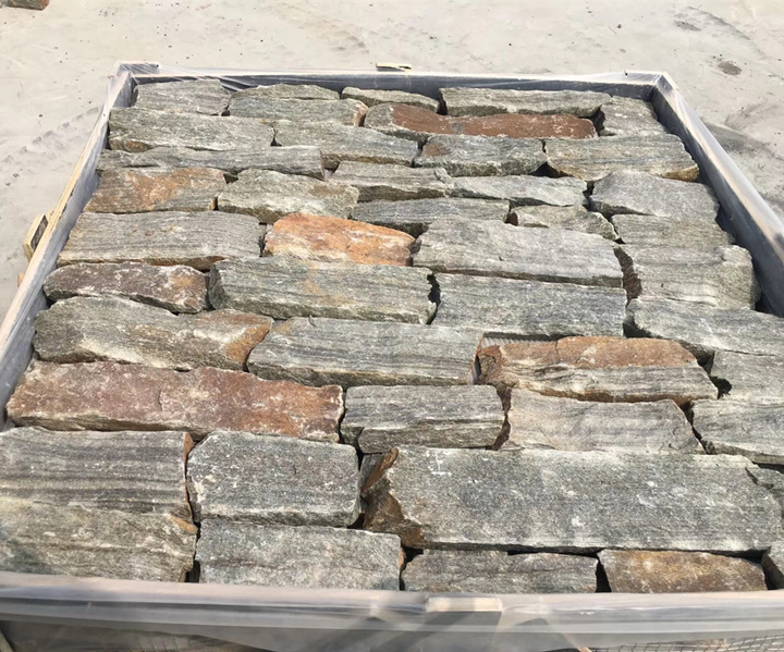 Natural Dry Stack Stone Veneer A close-up view of natural dry stack stone veneer in various shades