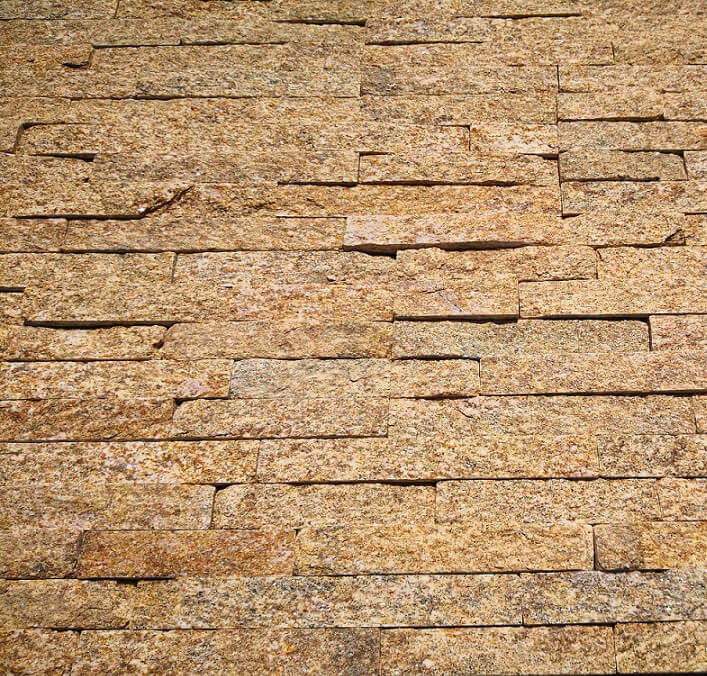 Quartzite Natural Stacked Stone Wall Panel Close-up view of natural stacked quartzite stone for wall decoration